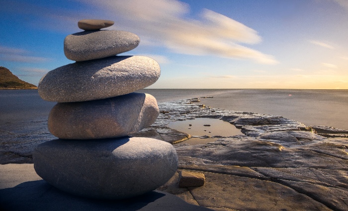 a stack of rocks representing stability. Just like mindfulness-based cognitive therapy does