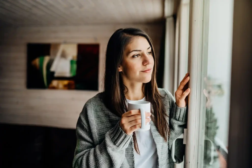 a women practicing being present - a recommendation from her psychotherapist during her mental health counselling session