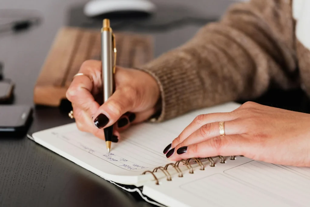 a client journaling in her distortion diary